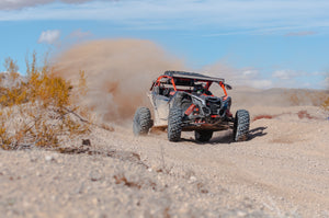Can-Am, Canam in the desert. Premium offroad, utv, and side by side accessories and maintenance parts. Raptor Offroad.